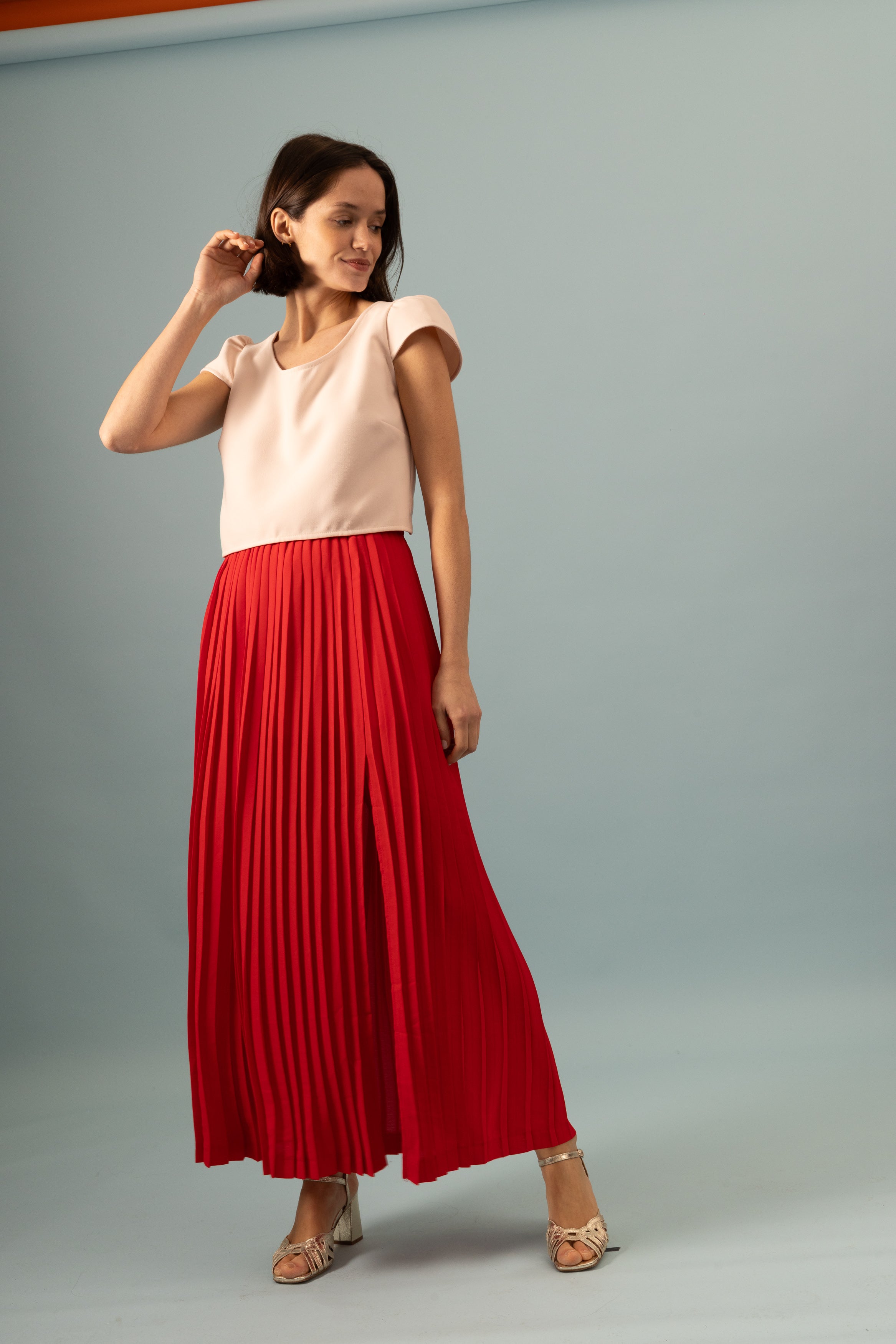 Jupe plissée longue fendue coquelicot