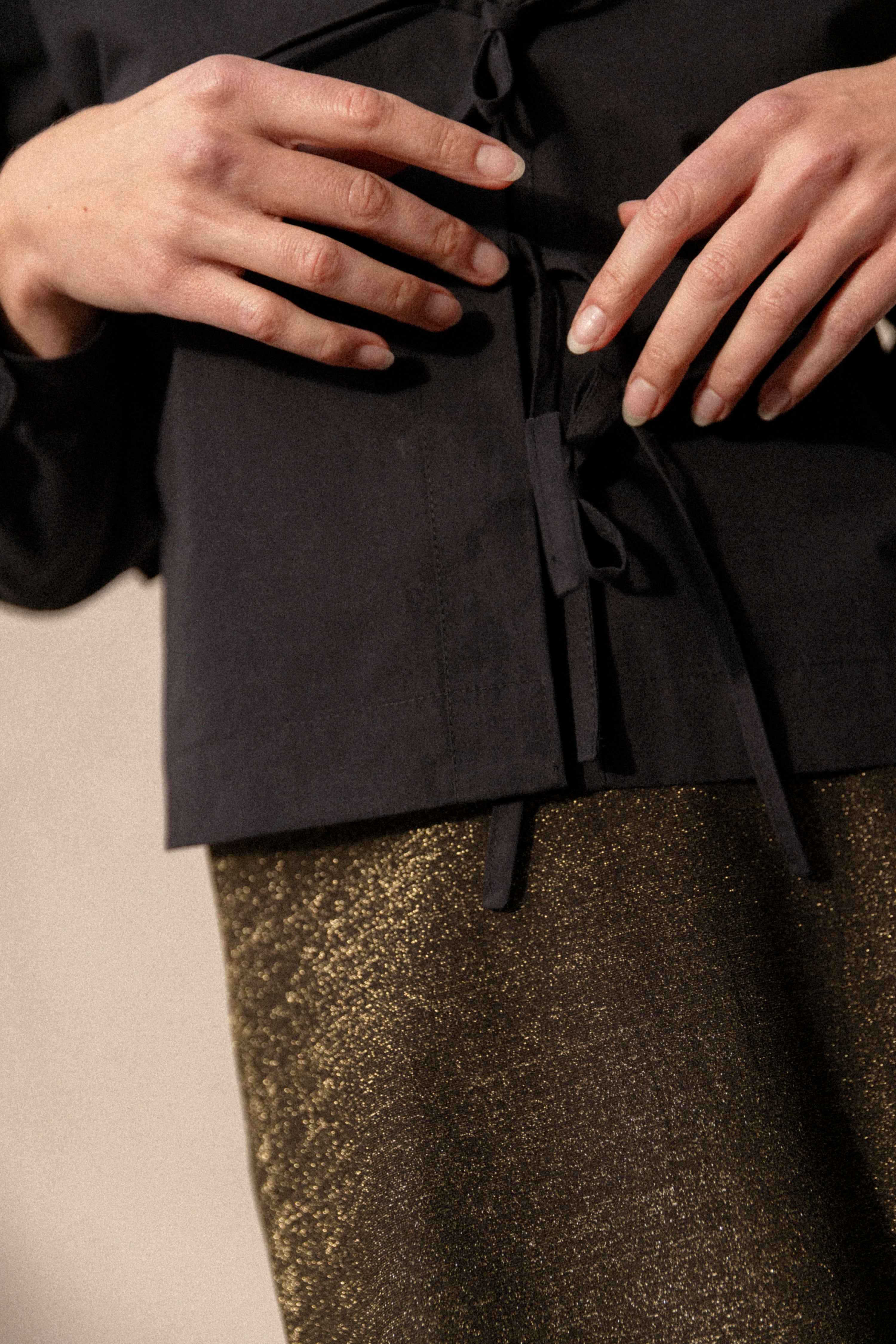 Black knotted blouse