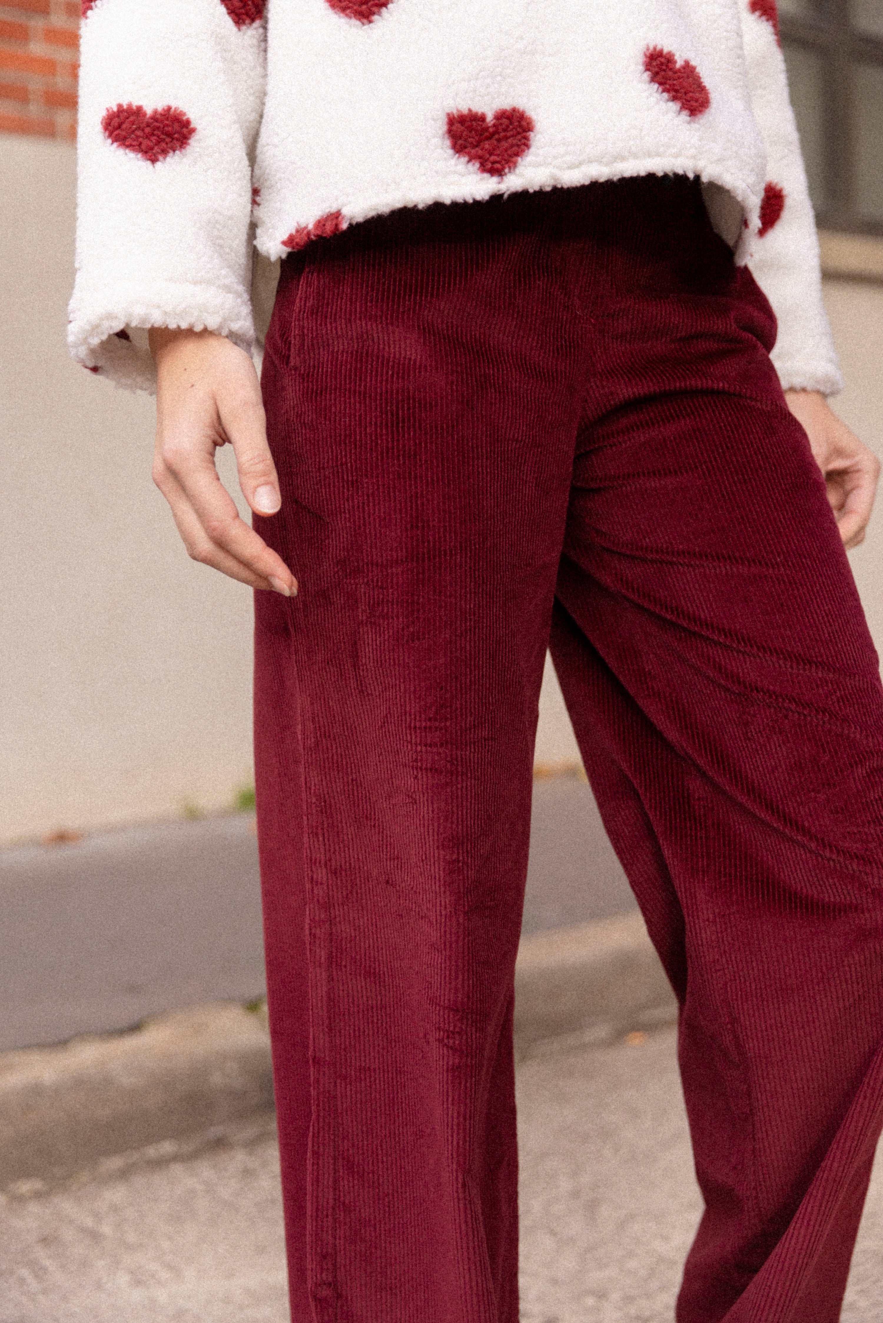 Wide-legged burgundy velvet trousers