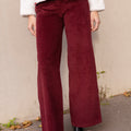 Wide-legged burgundy velvet trousers