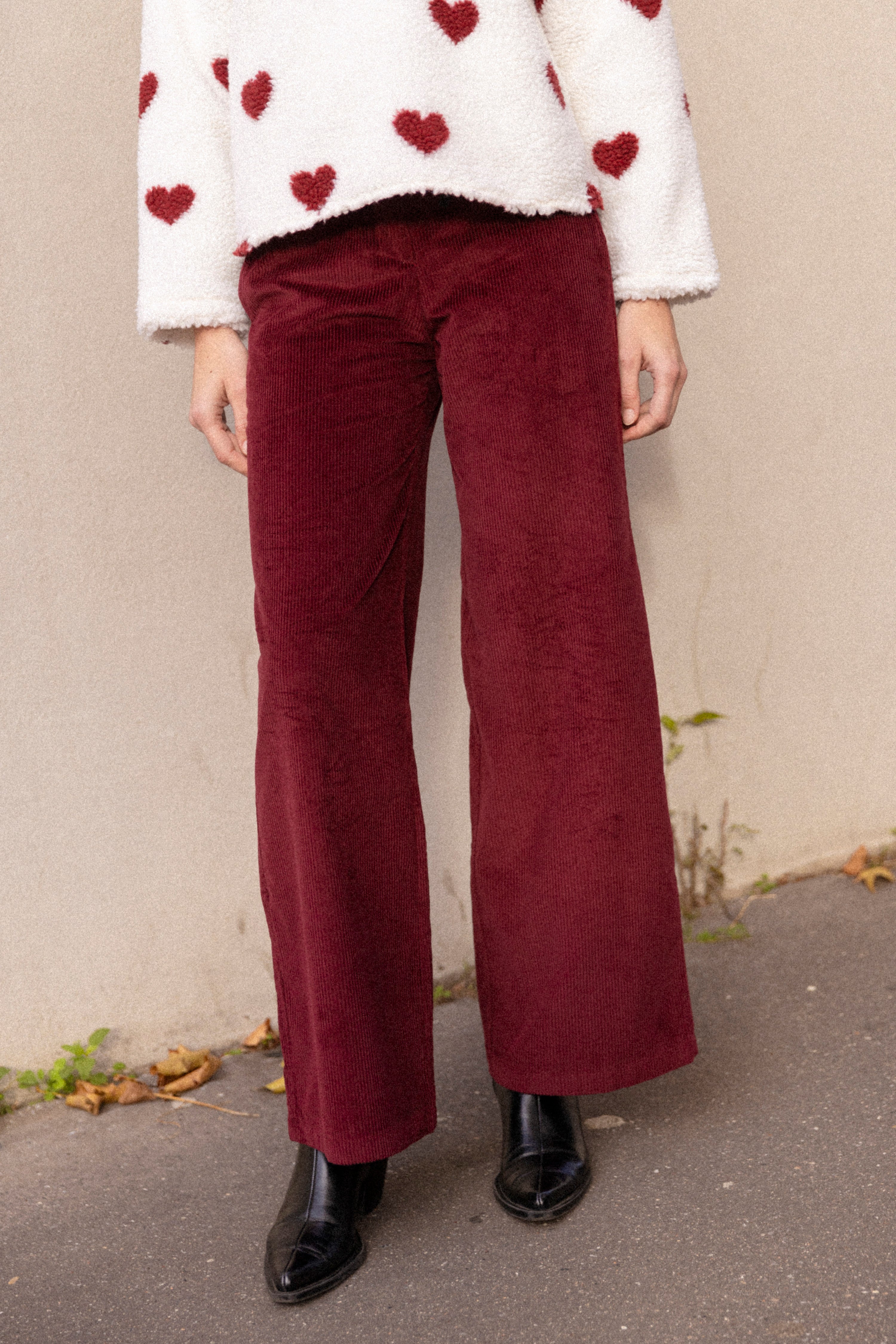 Wide-legged burgundy velvet trousers