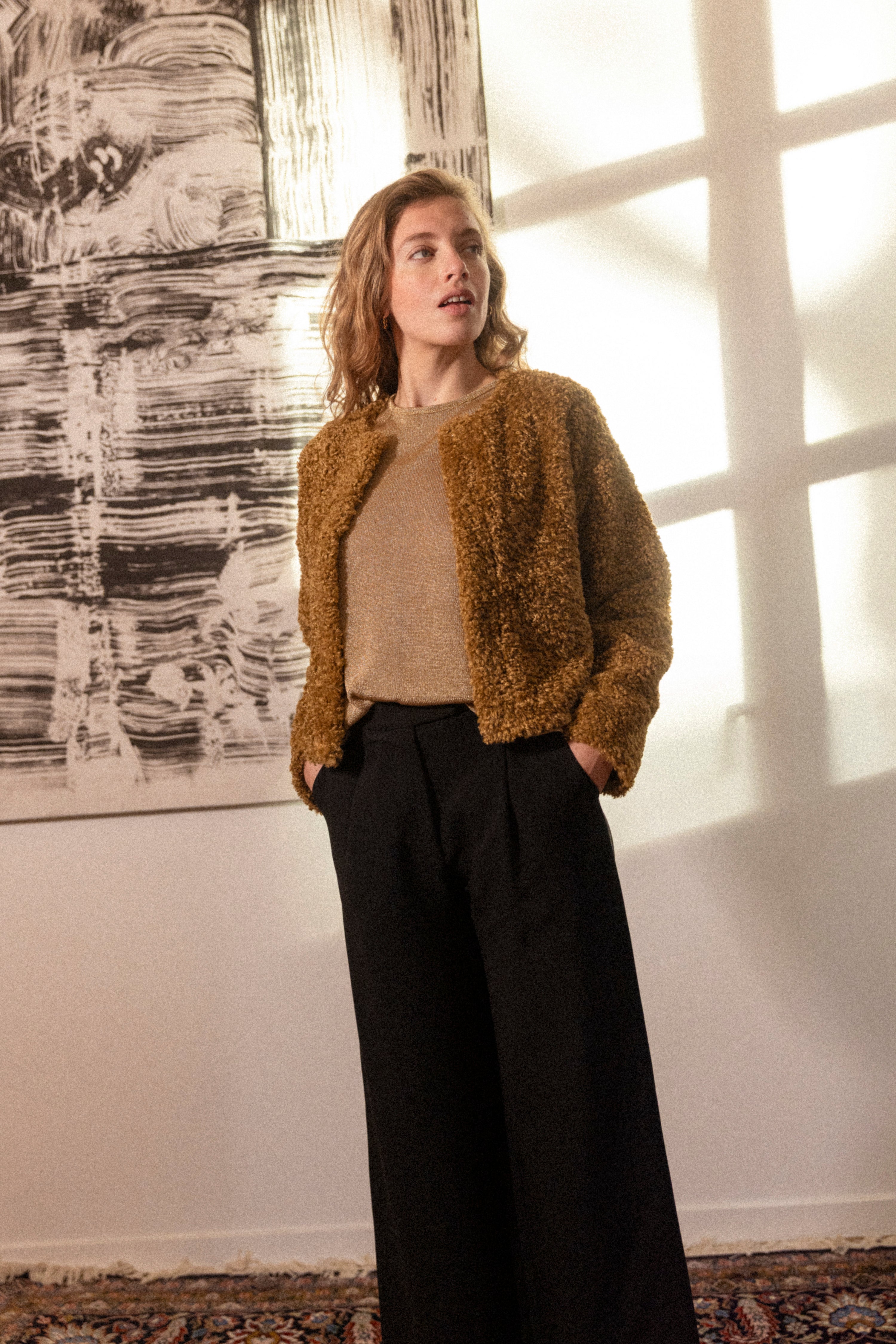 Black pleated trousers