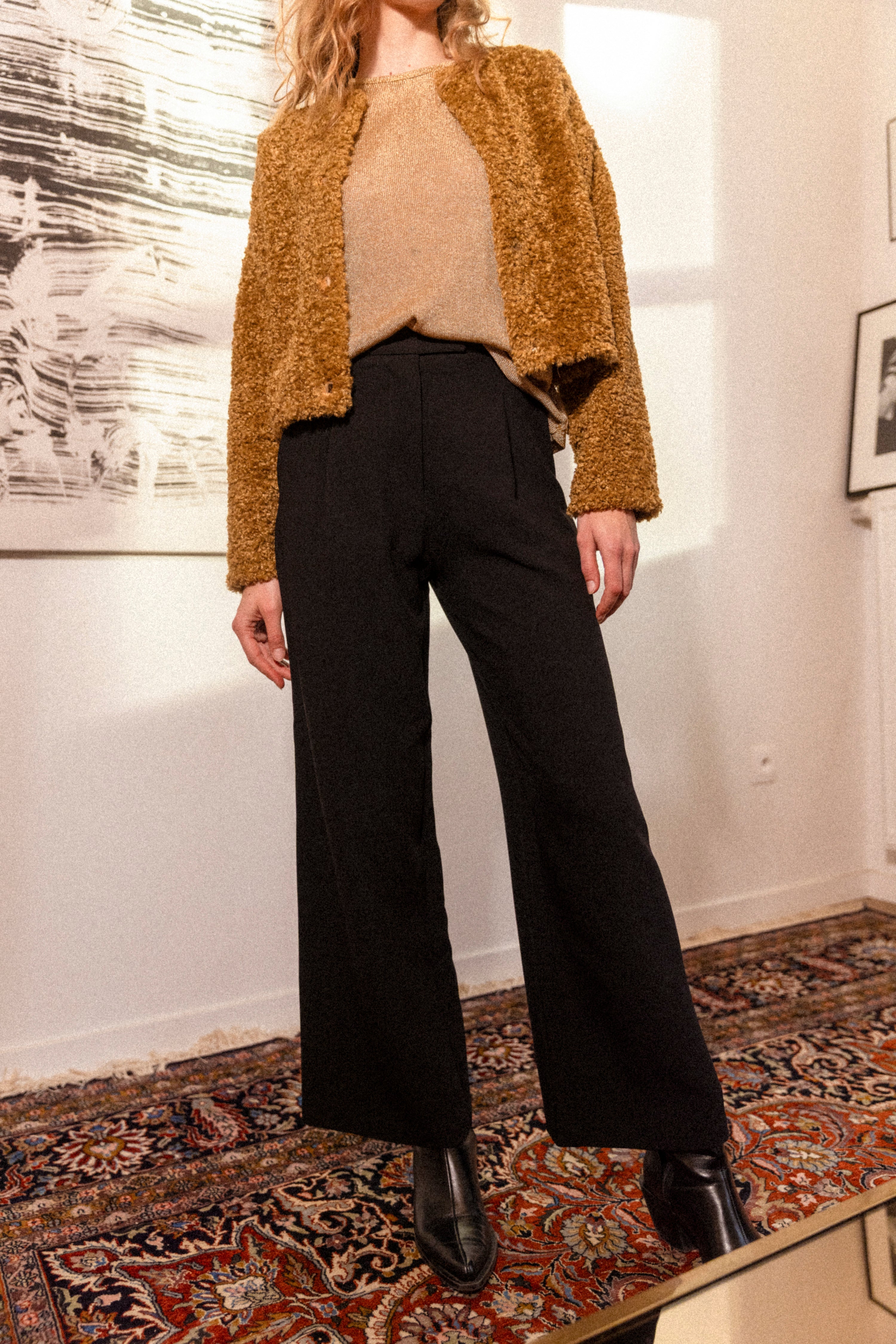 Black pleated trousers