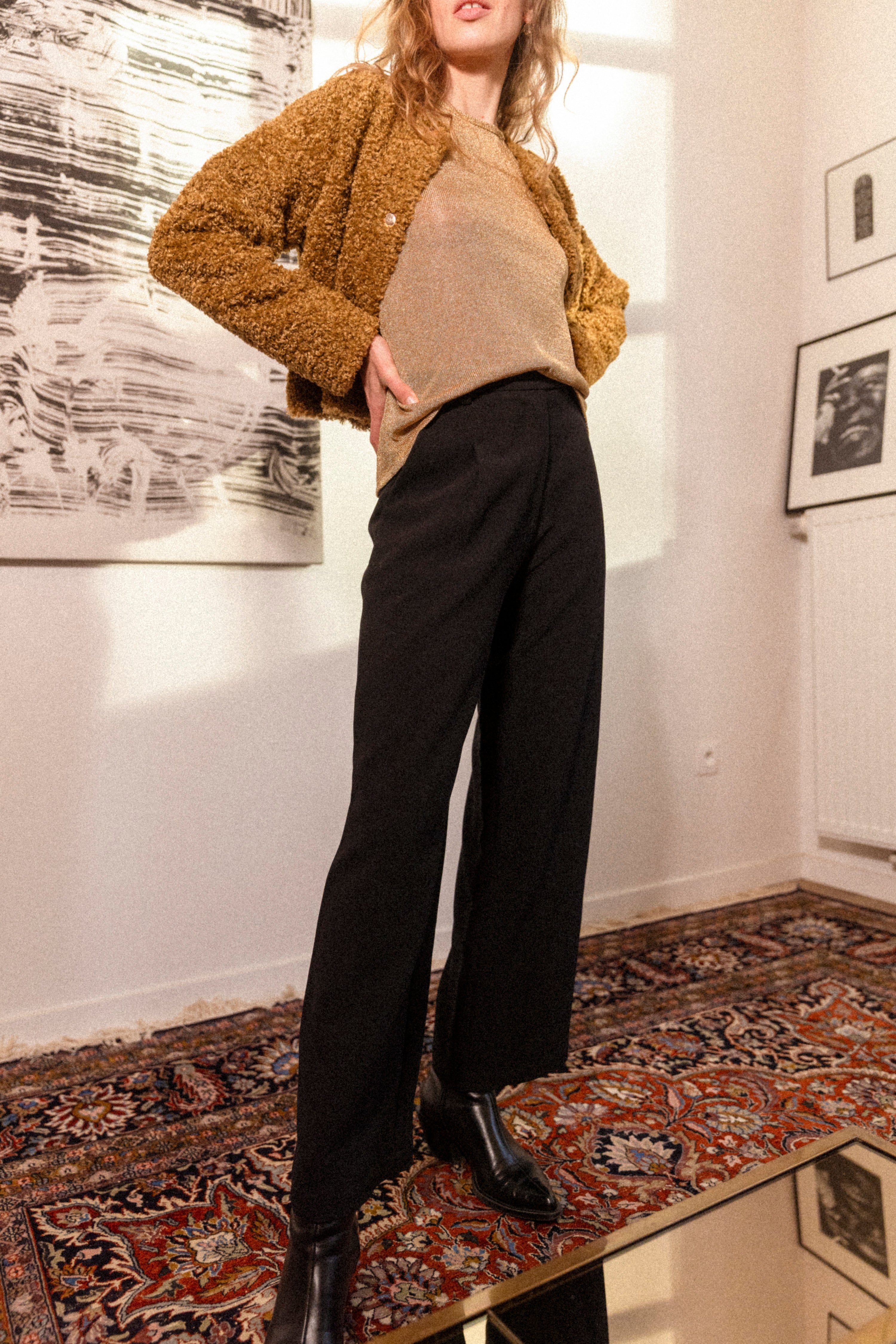 Black pleated trousers