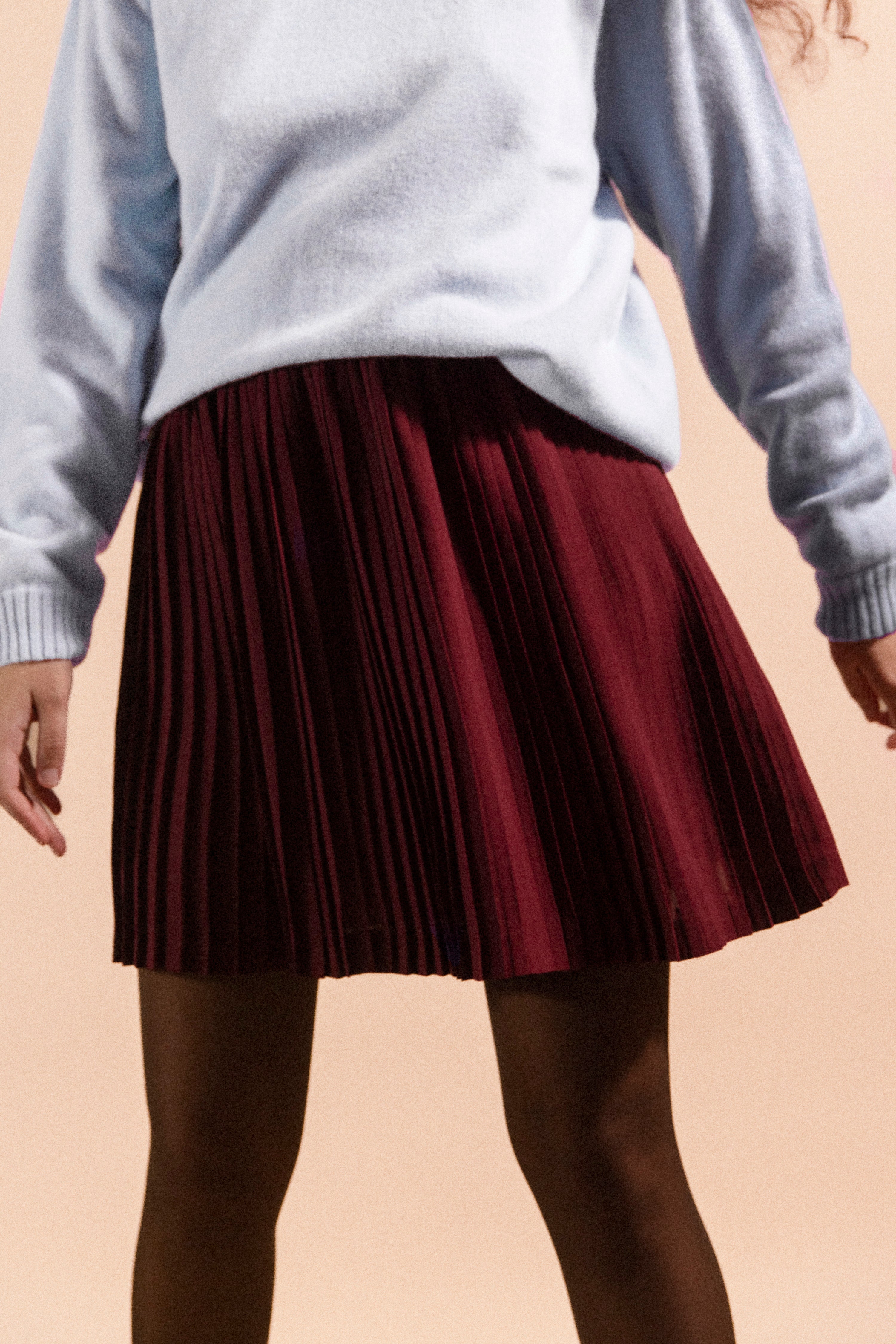 Jupe plissée courte bordeaux