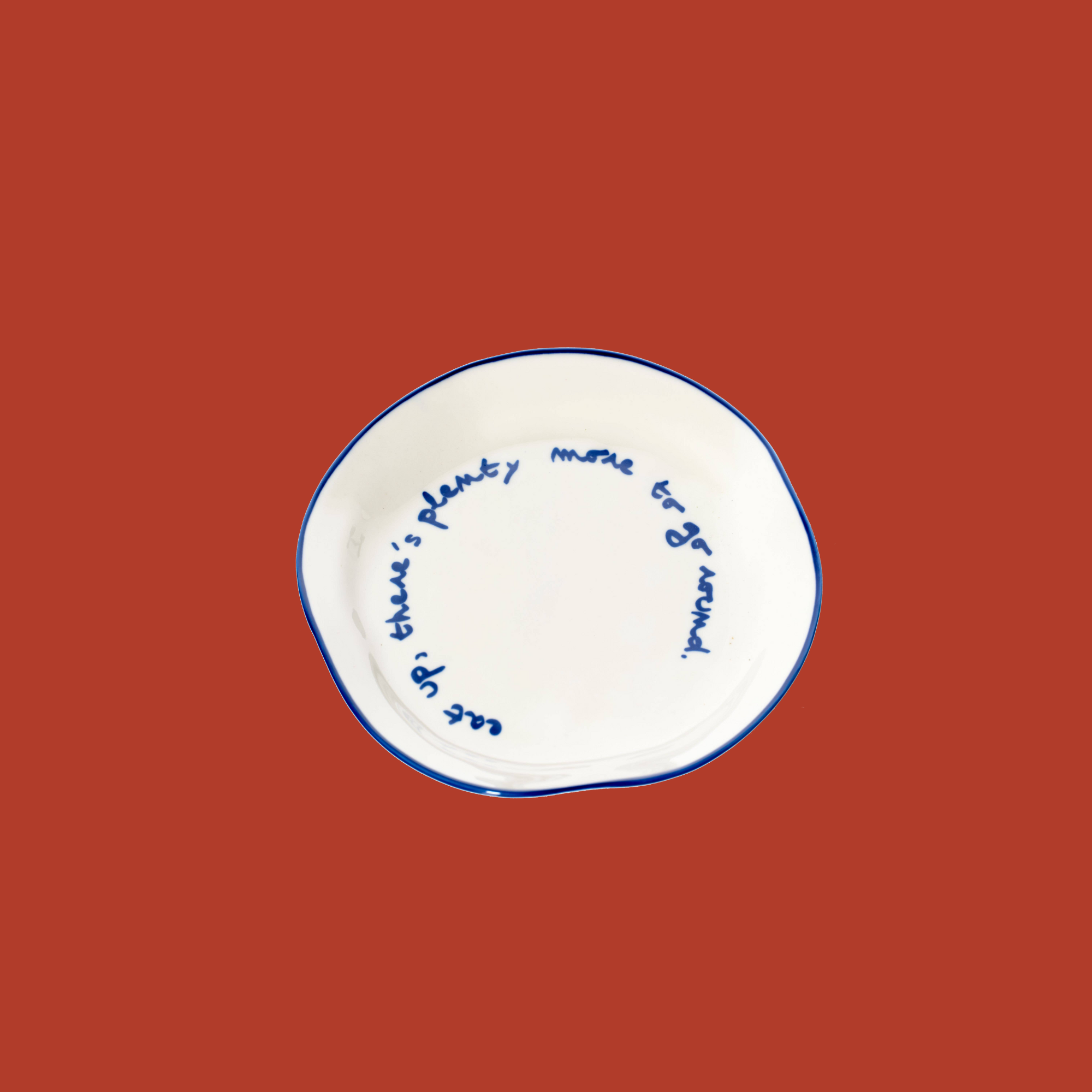 Plate with a message - "Eat, there's still plenty to share."
