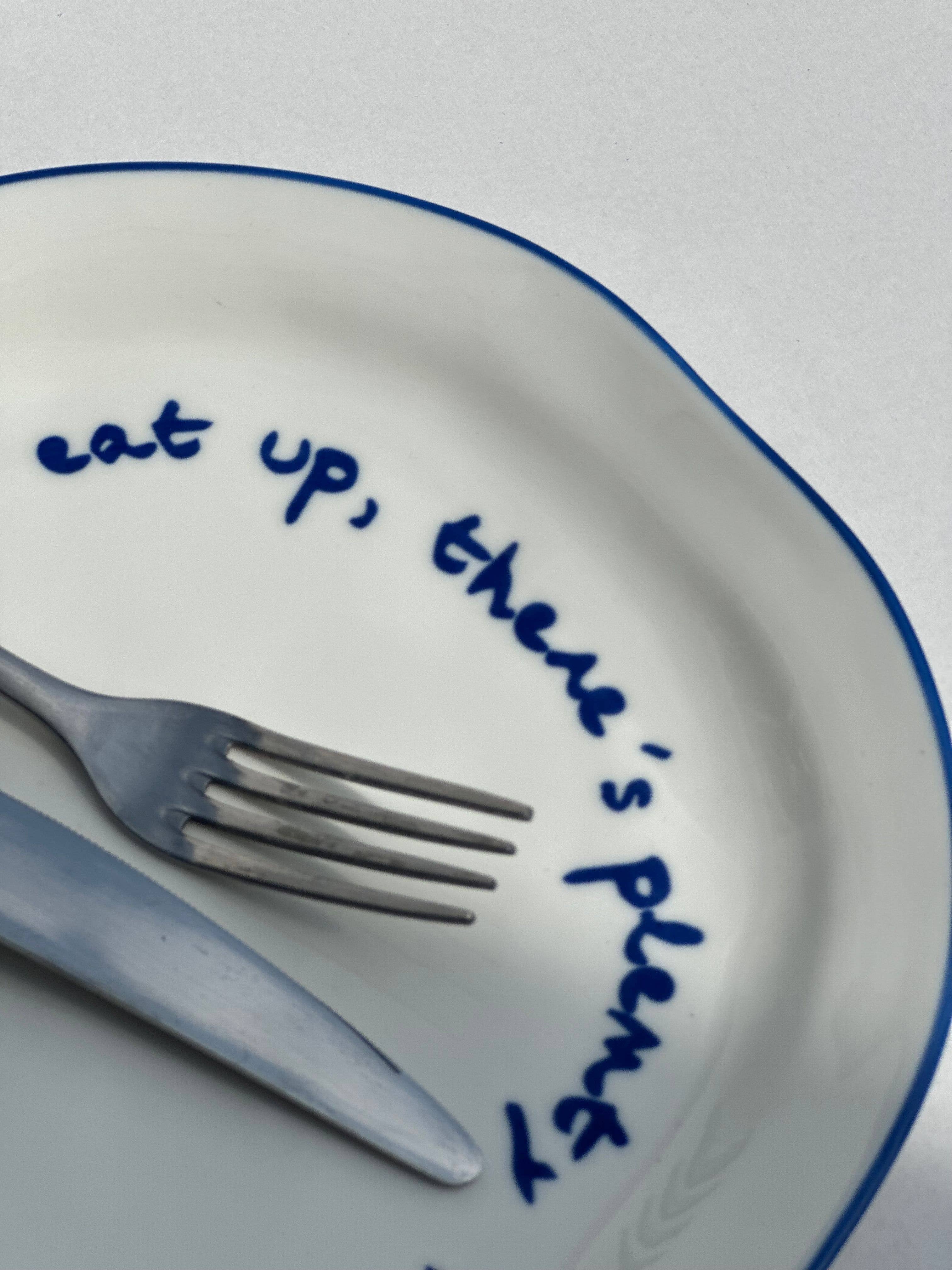 Plate with a message - "Eat, there's still plenty to share."