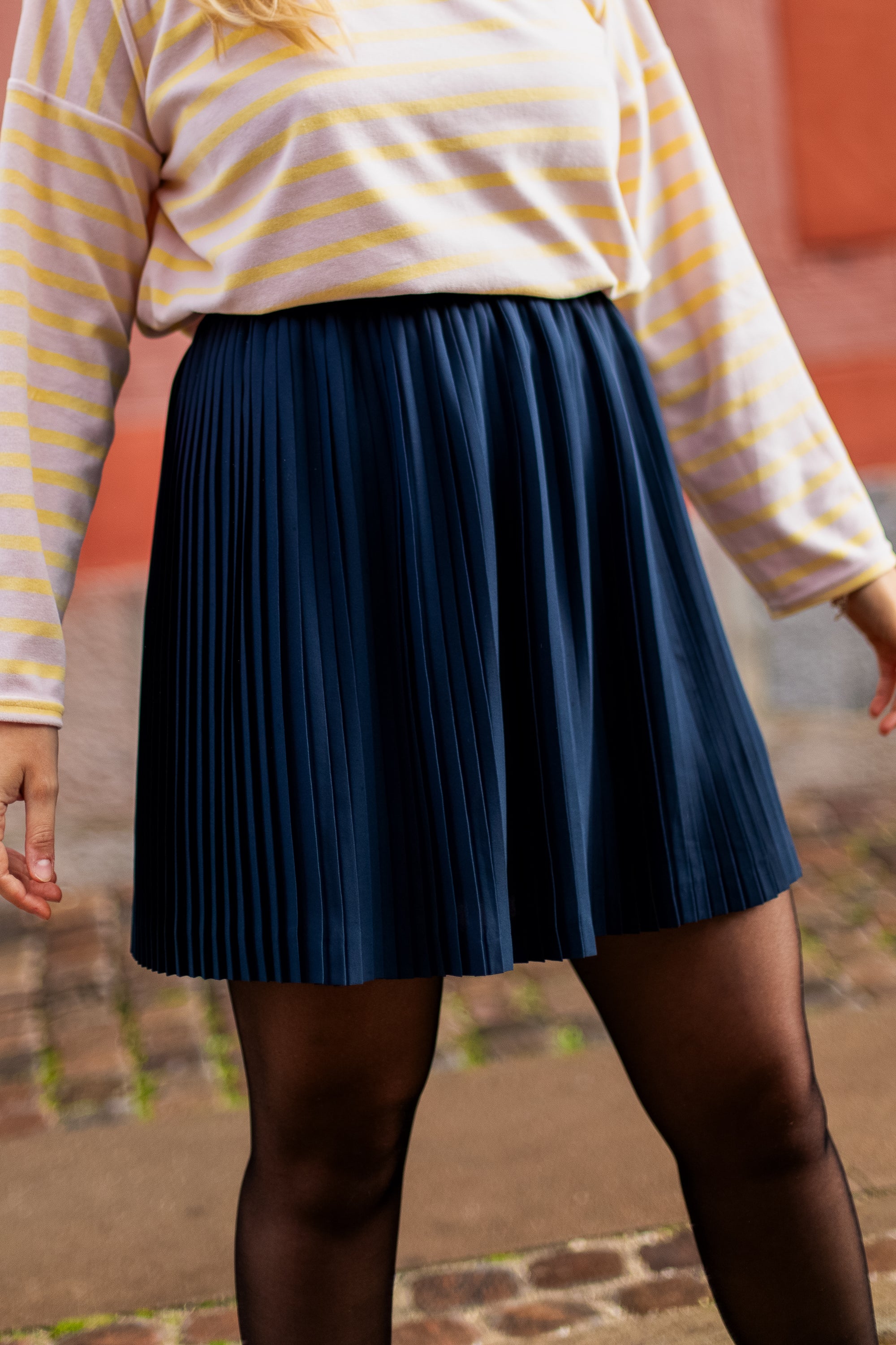 falda corta plisada de ferry 