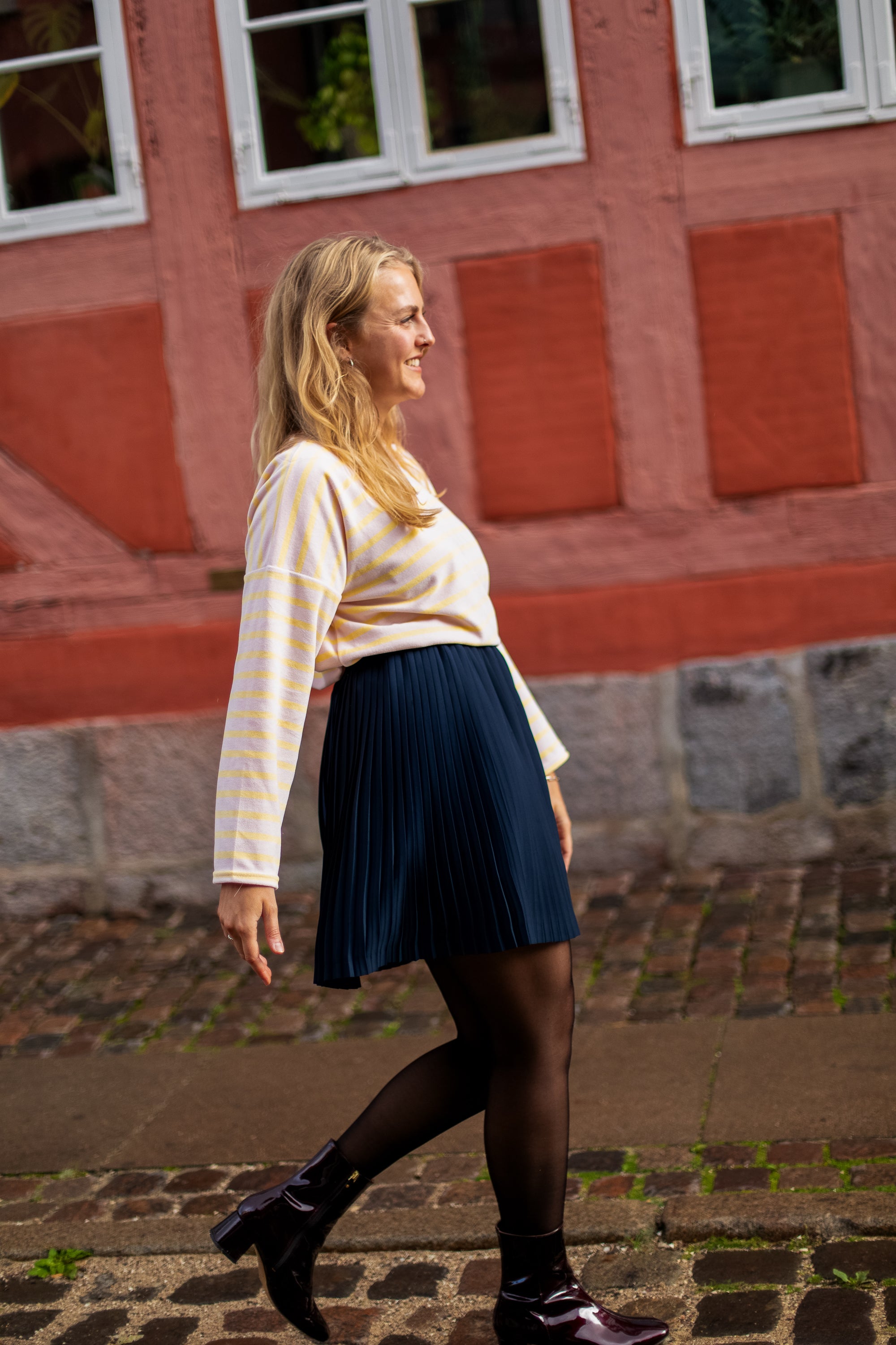 falda corta plisada de ferry 